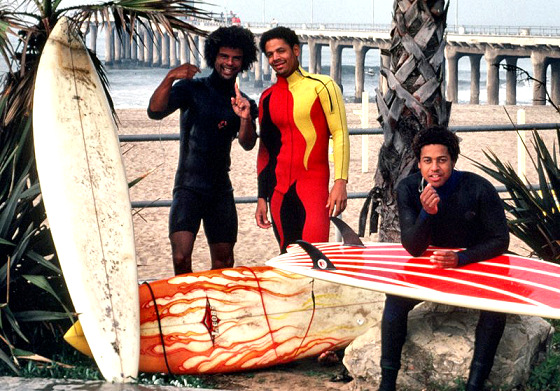 Black surfers: proudly wearing the new and exclusive firing wetsuits