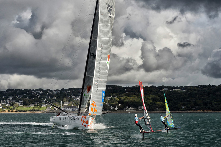IMOCA vs Windsurfer: the battle of the sails at the 2017 Finist'Air Sailing | Photo: Bellande/Finist'Air Sailing