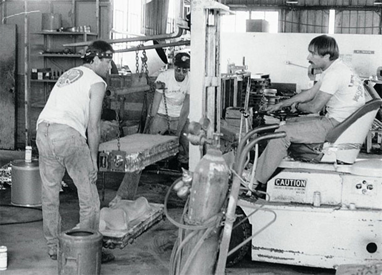 Eric Swenson, Craig Stecyk and Fausto Vitello, circa 1983: working at the Independent Truck Co foundry in San Francisco, California | Photo: MoFo
