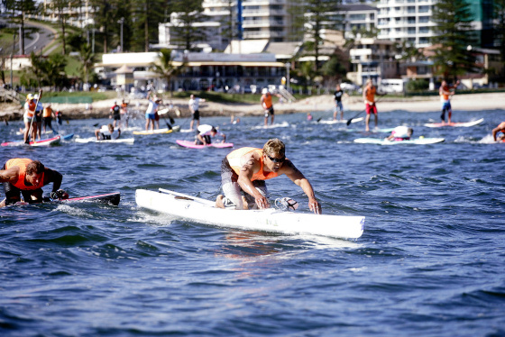 Jamie Mitchell wins the Honoula Ocean Paddle Race on the Gold Coast