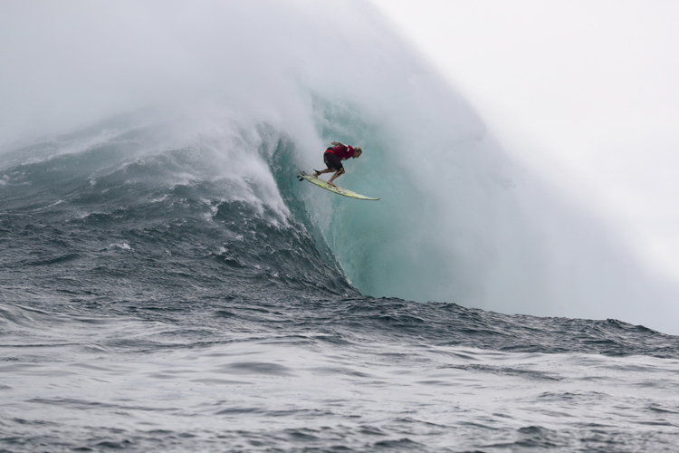 Keala Kennelly: negotiating a trick take-off at Jaws | Photo: Hallman