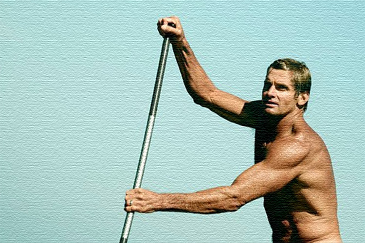 Laird Hamilton and Gabrielle Reece: you don't need clothes out in the sea | Photo: ESPN/Peggy Sirota