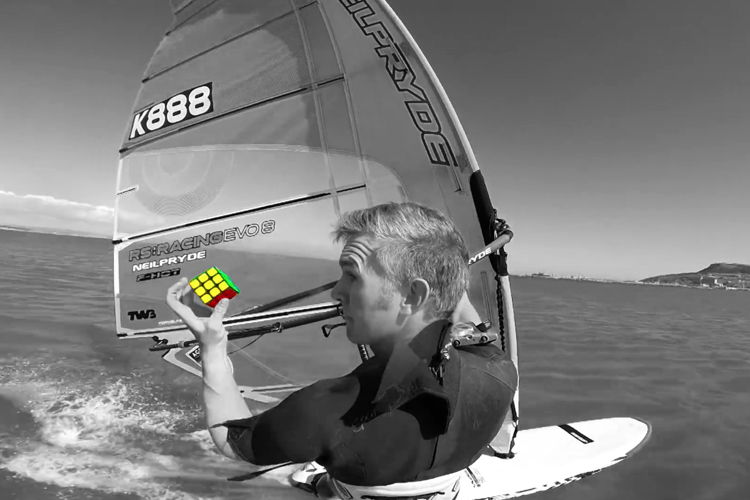 Michael George: he solves the Rubik's Cube while windsurfing
