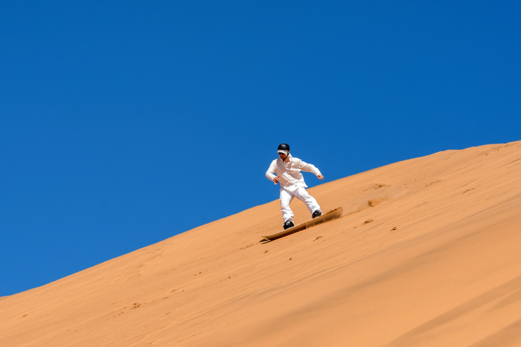 Sandboarding in the Namib Desert, Namibia | Photo: Shutterstock