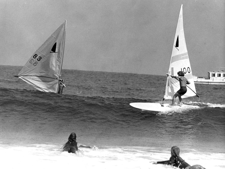 Original Windsurfer: stealing waves from a surfer in Malibu | Photo: OriginalWindsurfer.com