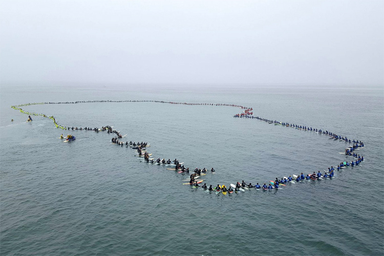 Surfing Circle of Honor: 511 surfers paddled out at Huntington Beach