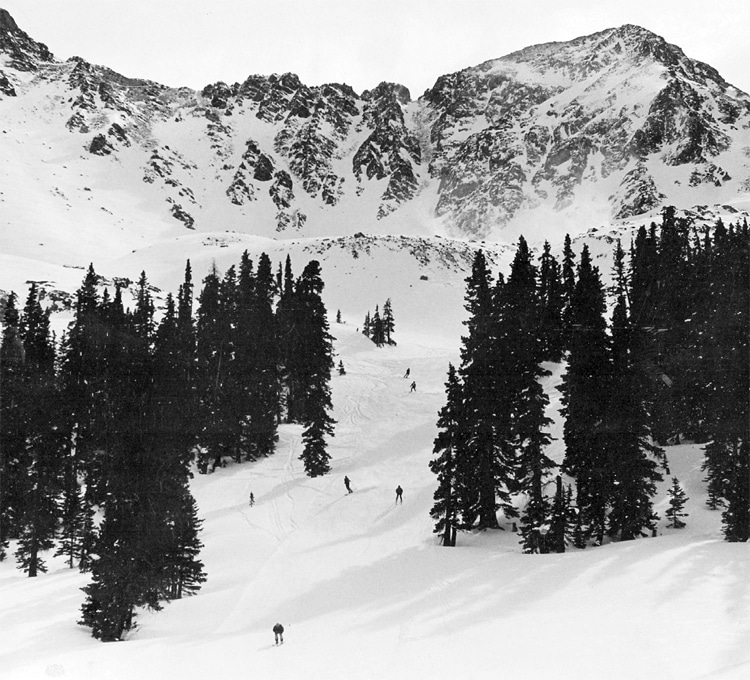 The craggy ridge-line of the east wall at A-Basin, Summit County, Colorado, circa 1976. Like the Sirens of Greek mythology, the waist-deep powder-filled troughs lured our 'outlaw' nature to scale the ridge and drop in, despite it being 'out of bounds.' | Photo: John 'Woody' Woodruff