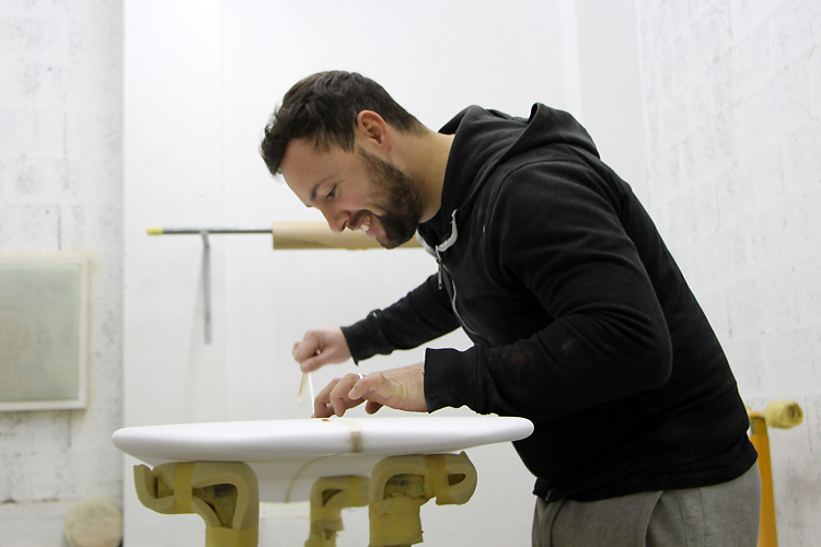 Boavista FC surfboard: applying tape to isolate the black and white squares | Photo: SurferToday