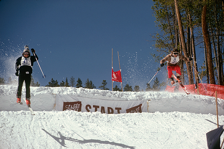 Keystone Challenge Cup II 1975 dual Giant Slalom (GS), upper jump. Copper Mountain racer and ARA logo designer Art Burrows (right) fly off the top jump | Photo: Bruce Schaefer