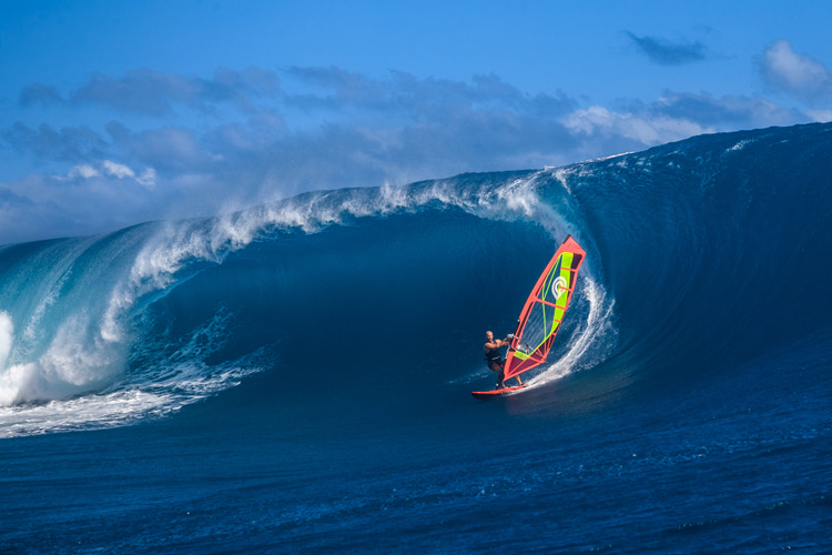 Charles Vandemeulebroucke: negotiating a safe line with his sail at triple overhead Teahupoo | Photo: Domenic Mosqueira