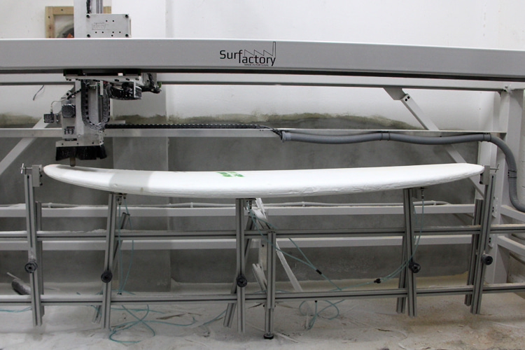 Surfboard shaping machine: modern surfboards are partially produced using computer numerical control (CNC) | Photo: SurferToday