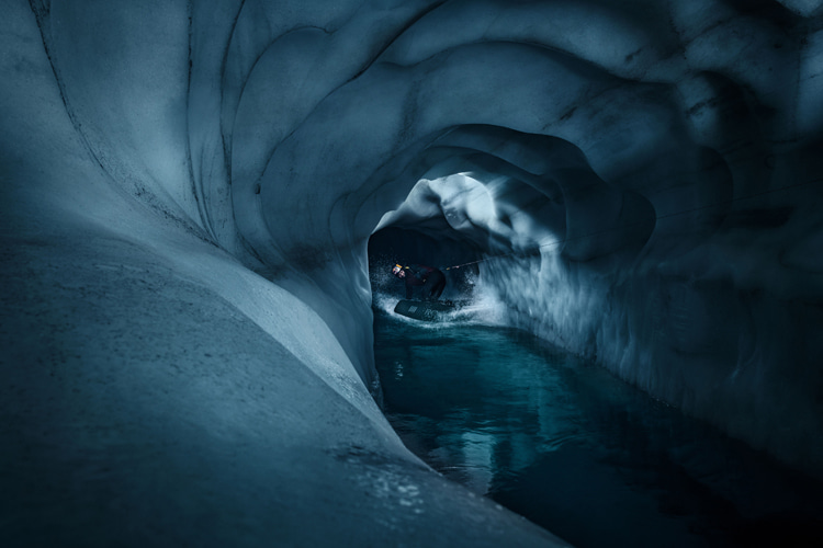 Dominik Hernler: riding a meltwater stream inside a glacier | Photo: Markus Berger