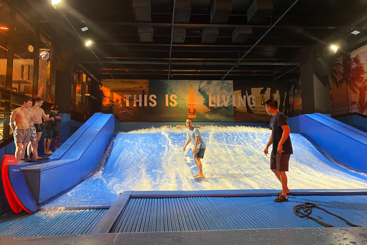 Surf House Helsinki: the founder of SurferToday rides the FlowRider for the first time | Photo: Reha Discioglu