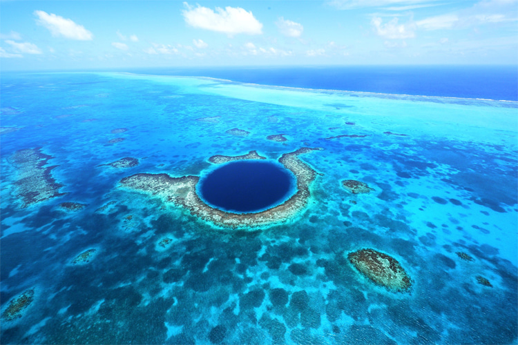 Great Blue Hole: the circular underwater sinkhole is 1,043 feet wide and 407 feet deep | Photo: Travel Belize