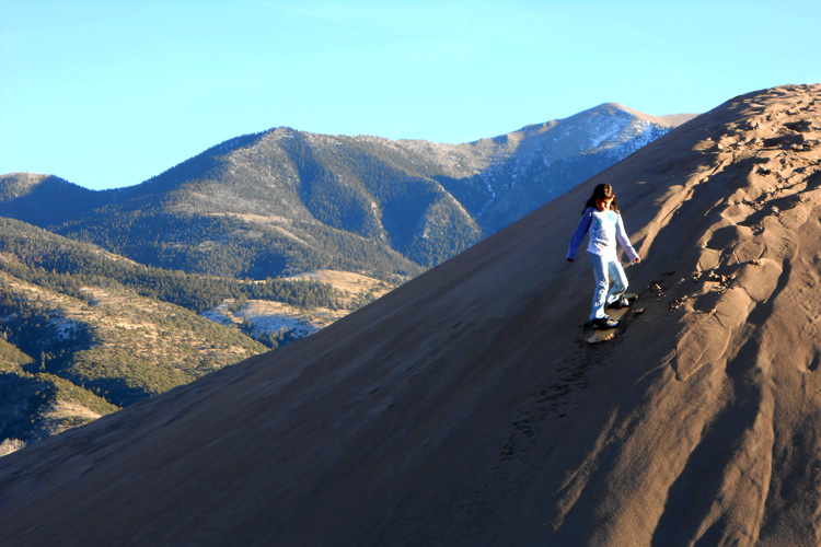 Sandboarding at the Great Sand Dunes National Park, USA | Photo: Myers/NPS