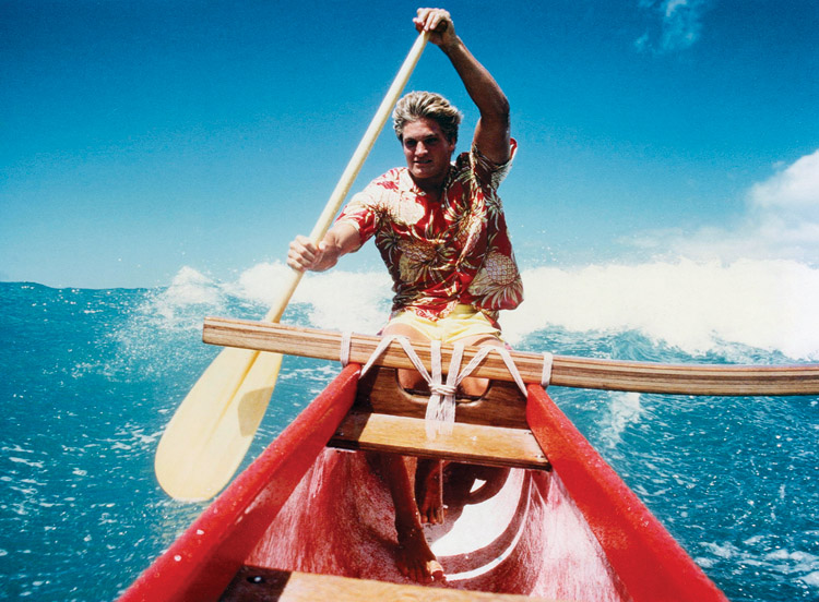 Marc Sandvold: paddling into a wave at Tongg's wearing a Canoes Aloha shirt | Photo: Darrell Wong
