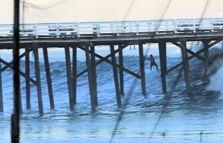 Laird Hamilton: shooting the Malibu Pier in overhead surf
