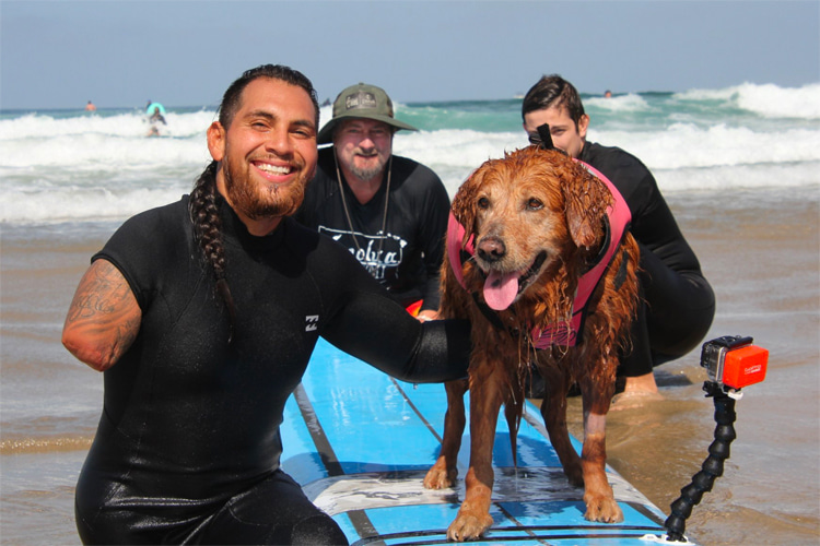 Jose Martinez and Richochet: surfing friends for life | Photo: Surf Dog Ricochet
