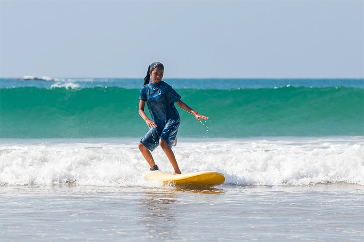 Muslim female surfer: wearing the special wetsuit developed by Finisterre | Photo: Finisterre