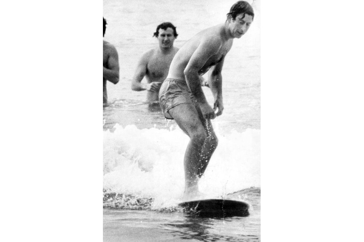 Charles, Prince of Wales, 1997: the monarch hits the cold water waves of Bondi Beach | Photo: Royal Archives
