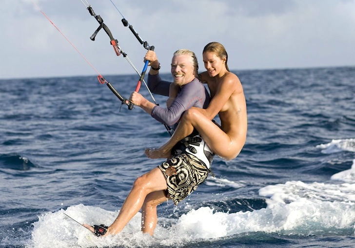 Richard Branson kiteboarding with naked model in the British Virgin Islands