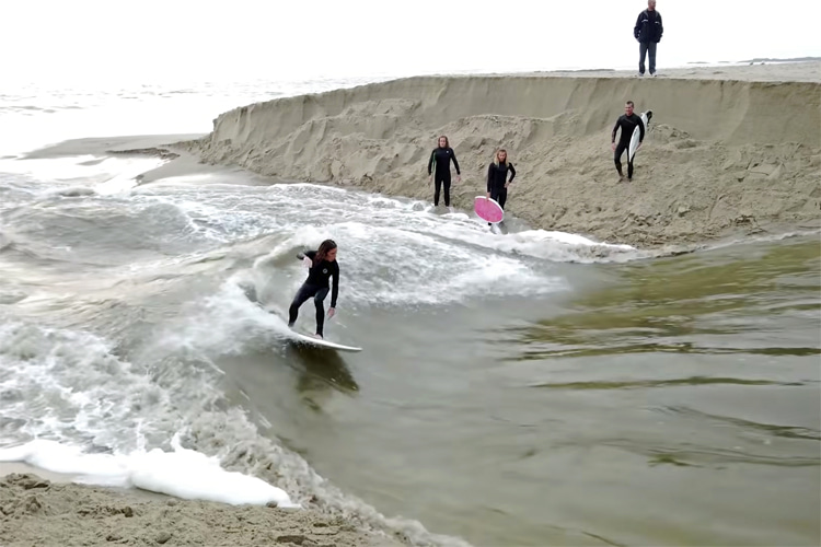 River mouth surfing: an artificial standing wave created where the river meets the ocean