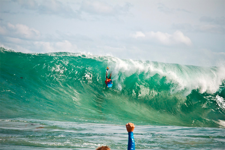 Ryan Hardy: a local The Box bodyboarder taking off on a giant wave | Photo: Sacha Specker/IBA