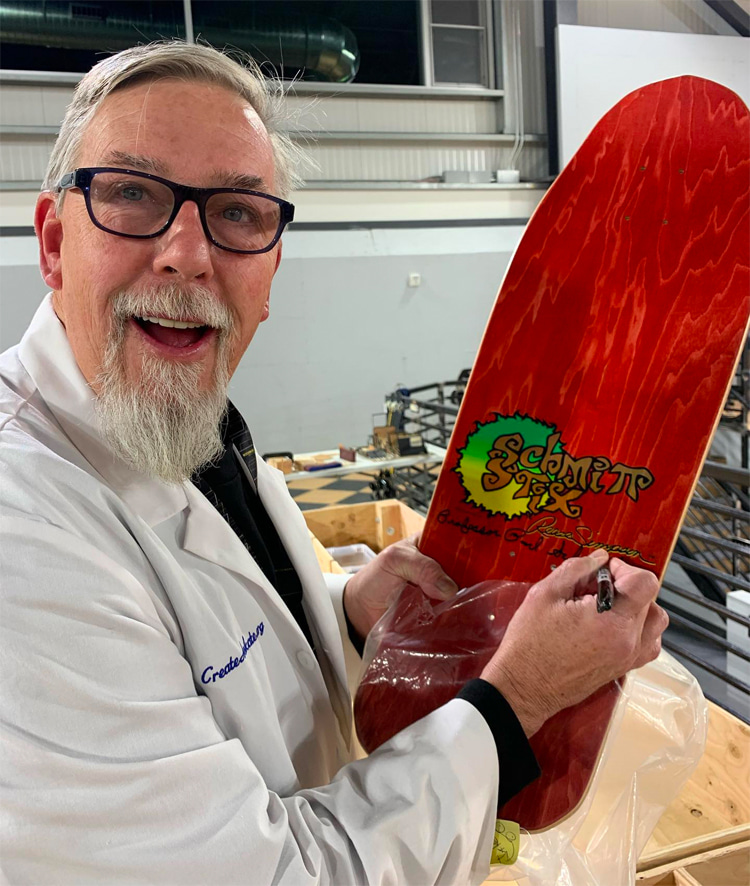 The Professor and his creation: Paul Schmitt proudly holds a Schmit Stix skateboard | Photo: Schmitt Archive