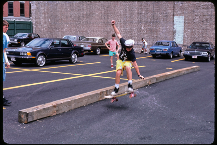 Massachusetts, 1987: skateboarding over a wooden beam in a parking lot | Photo: Douglas DeNatale/Library of Congress