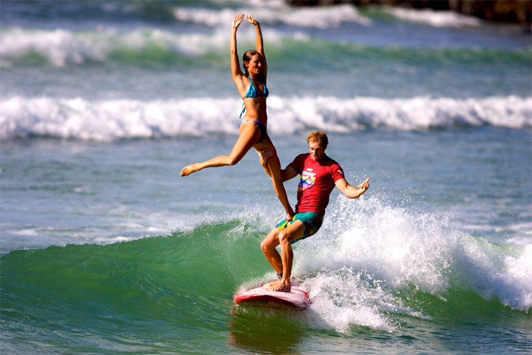 Tandem surfing: it takes two to ride this wave | Photo: Noosa Festival of Surfing