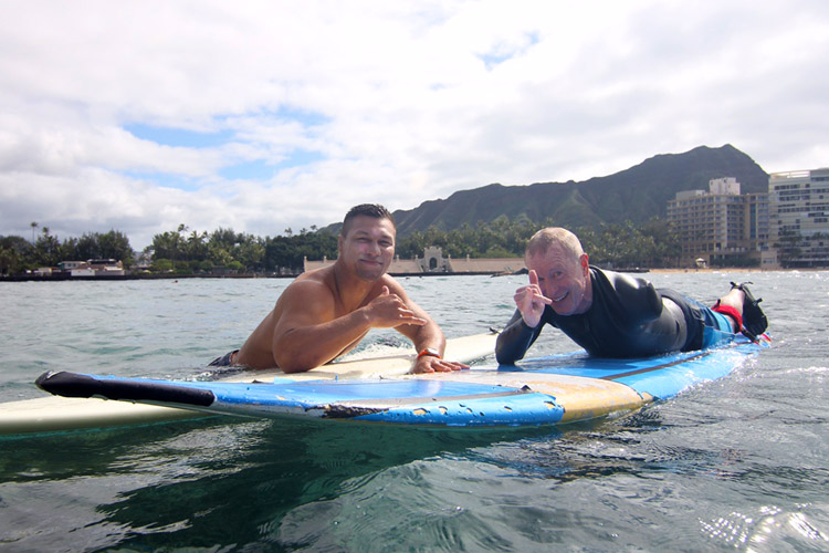 Lowen Tynanes and Steve Brown: one arm is all you need to have fun in the surf
