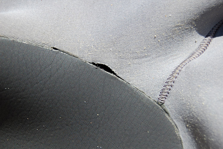 Wetsuit tear: get cement in that rubber hole | Photo: SurferToday